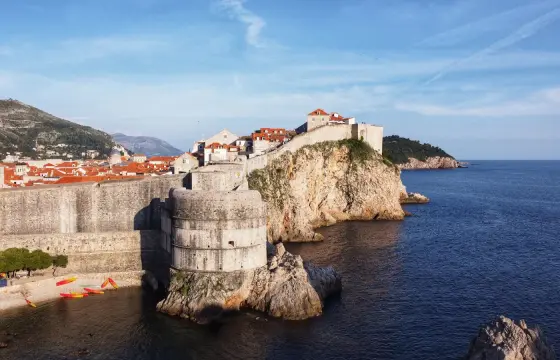 The city walls of Dubrovnik above the water